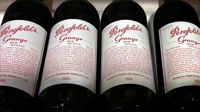 Bottles of Penfolds Grange, made by Australian wine maker Penfolds and owned by Australia&#39;s Treasury Wine Estates, sit on a shelf for sale at a wine shop in central Sydney, Australia, August 4, 2014