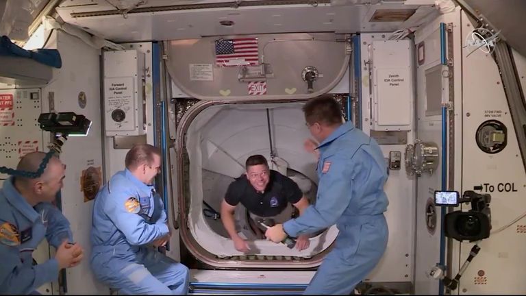 NASA astronaut Bob Behnken arrives at the International Space Station aboard SpaceX's Crew Dragon capsule in this still image taken from video May 31, 2020. Pic: NASA