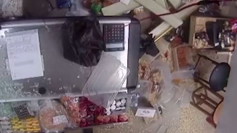 Supermarket windows are blown out and shelves knocked over by aftershock of Beirut blast