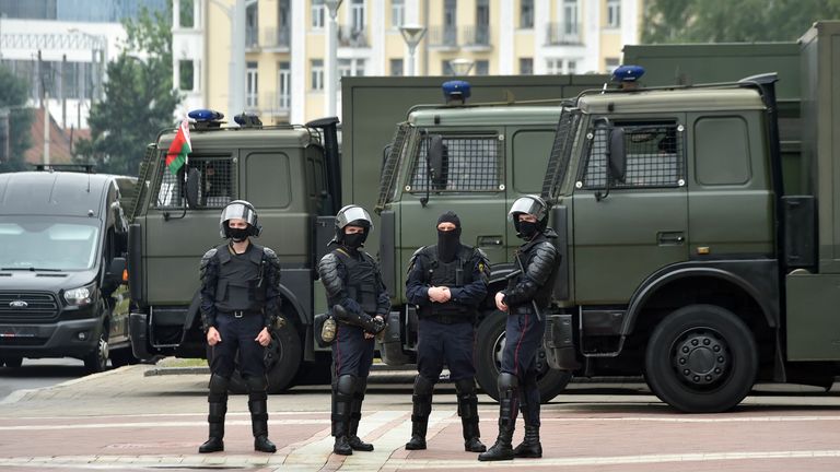 Law enforcement officers guard an area during the opposition rally