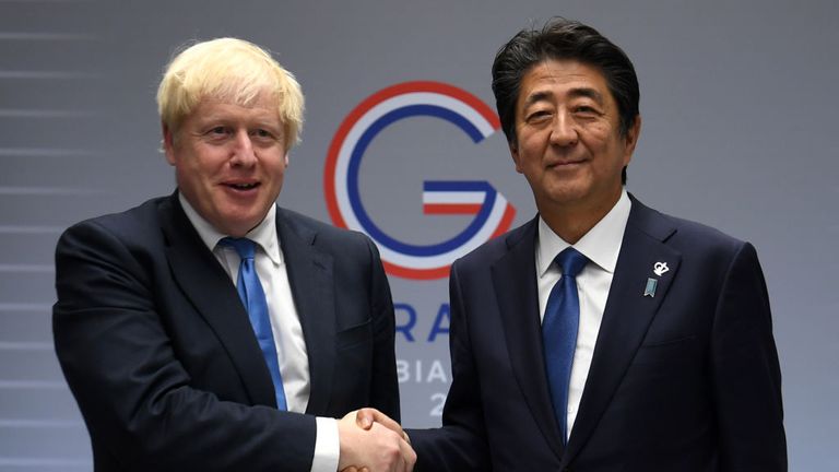BIARRITZ, FRANCE - AUGUST 26: Britain&#39;s Prime Minister Boris Johnson (L) meets Japanese Prime Minister Shinzo Abe (R) for their bilateral talks during the G7 Summit on August 26, 2019 in Biarritz, France. The French southwestern seaside resort of Biarritz is hosting the 45th G7 summit from August 26 to 26. High on the agenda will be the climate emergency, the US-China trade war, Britain&#39;s departure from the EU, and emergency talks on the Amazon wildfire crisis. (Photo by Neil Hall - Pool/Getty I