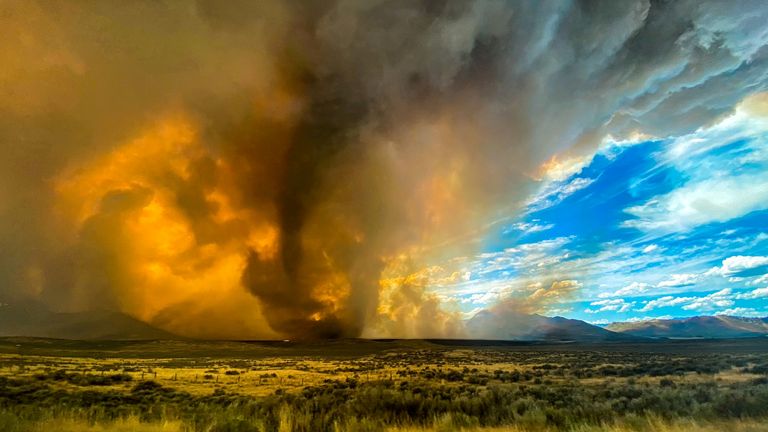 Funnel appearing in thick plume of smoke from the Loyalton Fire is seen in Lassen County, California, U.S. August 15, 2020, in this image obtained from social media. Courtesy of Katelynn Hewlett/Social Media via REUTERS. ATTENTION EDITORS - THIS IMAGE HAS BEEN SUPPLIED BY A THIRD PARTY. MANDATORY CREDIT KATELYNN HEWLETT. NO RESALES. NO ARCHIVES.
