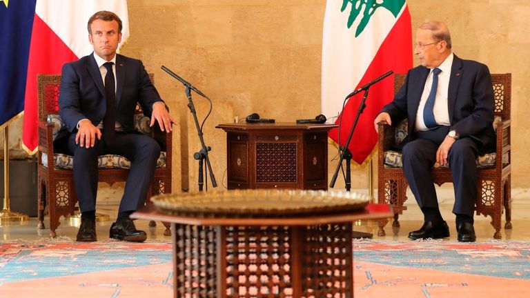 Mr Macron met with Lebanese president Michel Aoun, right, on Thursday