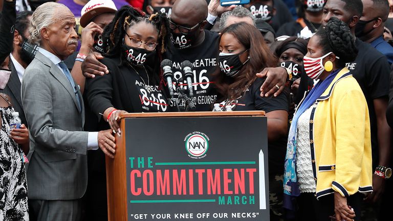 Rev. Al Sharpton (L), Bridgett Floyd (2nd L) and Philonise Floyd (C), siblings of George Floyd, and Rep. Sheila Jackson Lee (R) stand at the podium at the 2020 March on Washington, officially known as the “Commitment March: Get Your Knee Off Our Necks,” at the Lincoln Memorial on August 28, 2020 in Washington, DC. 