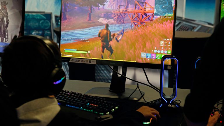 A gamer plays the video game 'Fortnite' developed by Epic Games during the 'Paris Games Week' on October 29, 2019 in Paris, France
