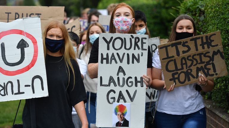 Students from Codsall Community High School march to the constituency office of their local MP Gavin Williamson, who is also the Education Secretary, as a protest over the continuing issues of last week&#39;s A level results which saw some candidates receive lower-than-expected grades after their exams were cancelled as a result of coronavirus