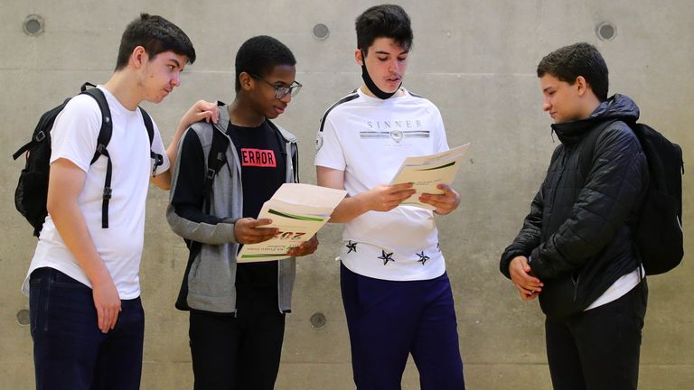 Students discuss their GCSE results at Ark Evelyn Grace Academy, London.