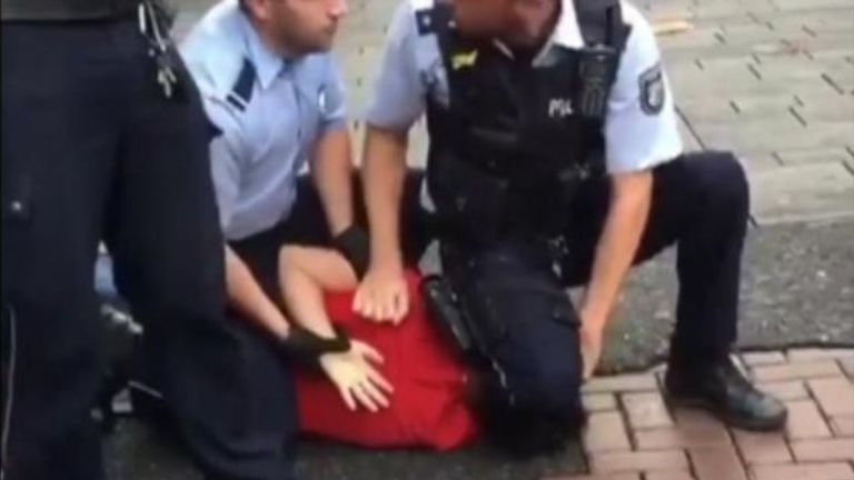 German police kneel on innocent man&#39;s neck