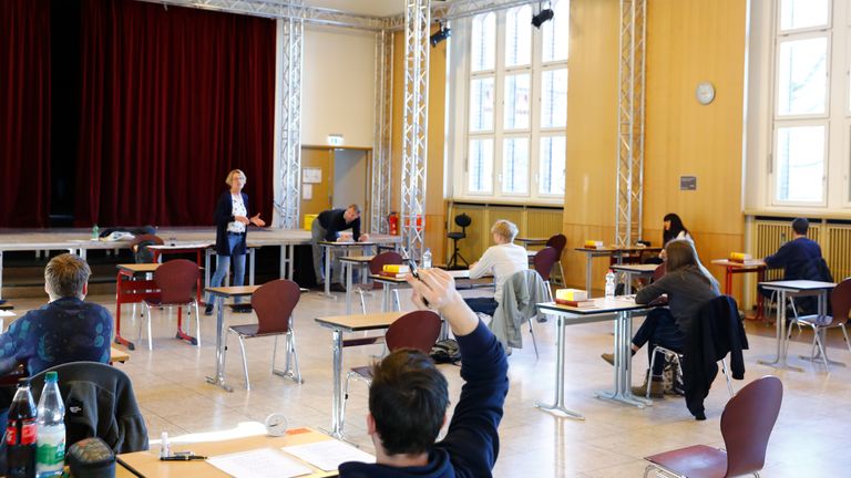 Students prepare to take an exam at the Gymnasium Steglitz school in Berlin