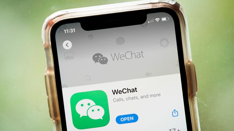 WASHINGTON, DC - AUGUST 07: In this photo illustration, the WeChat app is displayed in the App Store on an Apple iPhone on August 7, 2020 in Washington, DC. On Thursday evening, President Donald Trump signed an executive order that bans any transactions between the parent company of TikTok, ByteDance, and U.S. citizens due to national security reasons. The president signed a separate executive order banning transactions with China-based tech company Tencent, which owns the app WeChat. Both order