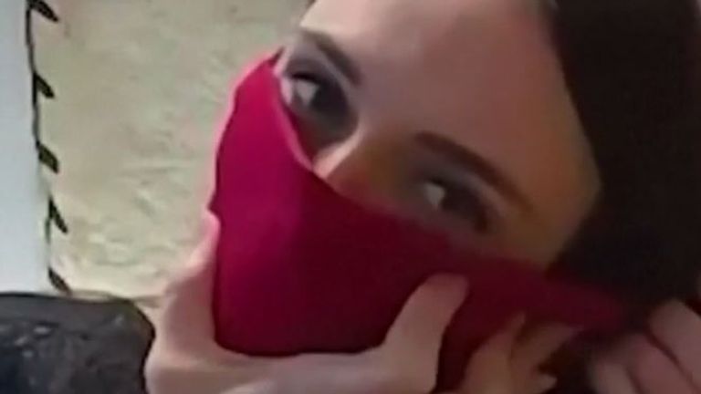 Jacinda Arden makes a face covering