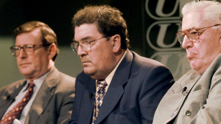 John Hume takes part in an interview after Northern Ireland votes in support of the peace deals signed on Good Friday