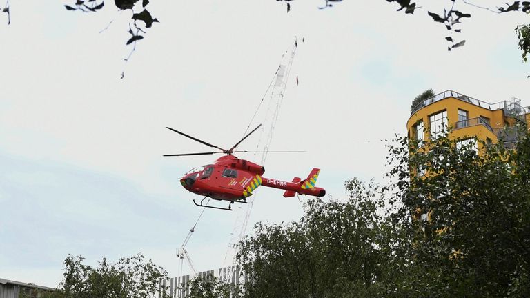 A London Air Ambulance helicopter takes off from outside the Tate Modern gallery in London on August 4, 2019 after it was put on lock down and evacuated after an incident involving a child falling from height and being airlifted to hospital. - London&#39;s Tate Modern gallery was evacuated on Sunday after a child fell "from a height" and was airlifted to hospital. A teenager was arrested over the incident, police said, without giving any details of the child&#39;s condition. (Photo by Daniel SORABJI / A