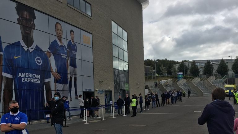 The socially distanced queue outside of the Amex