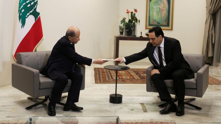 Lebanon&#39;s Prime Minister Hassan Diab submits his resignation to Lebanon&#39;s President Michel Aoun at the presidential palace in Baabda, Lebanon