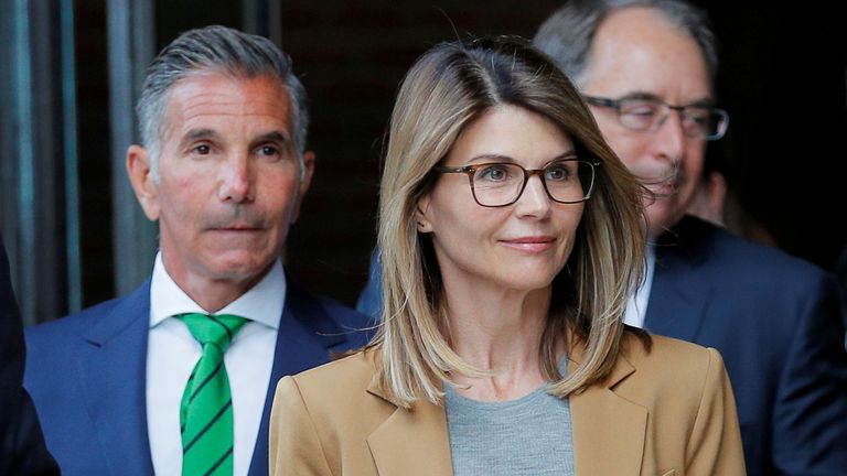 Lori Loughlin and Mossimo Giannulli leaving court last year