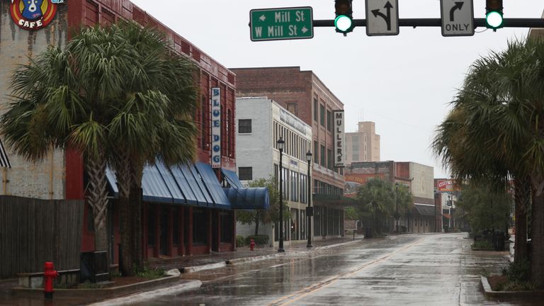 A main street in the business area of Lake Charles, Louisiana, is empty as people seek safe shelter