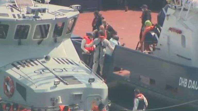 Migrants are brought ashore in Dover