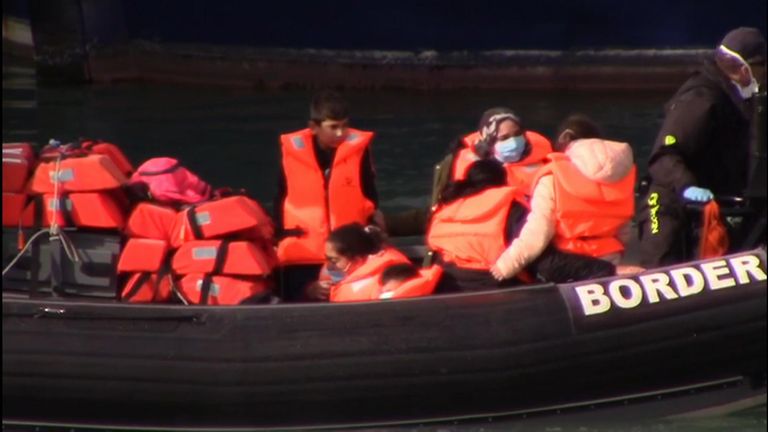 Migrants being rescued by coastguards