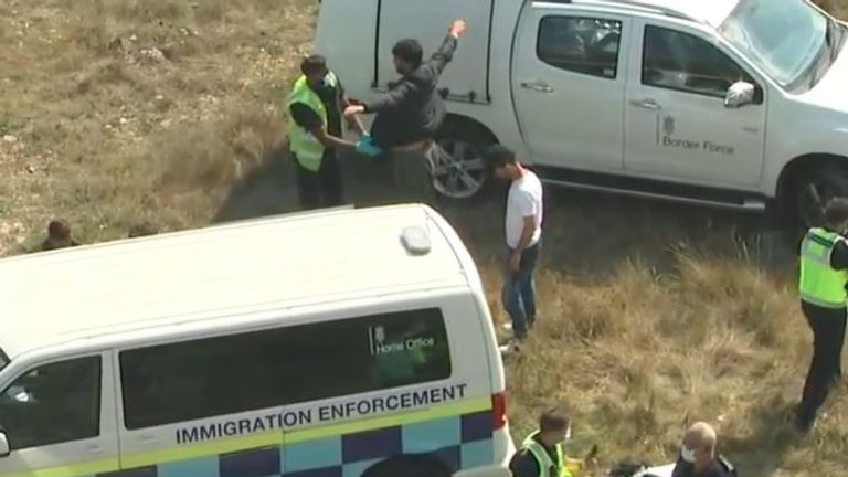 Border Force representatives meet migrants at Kingsdown in Kent