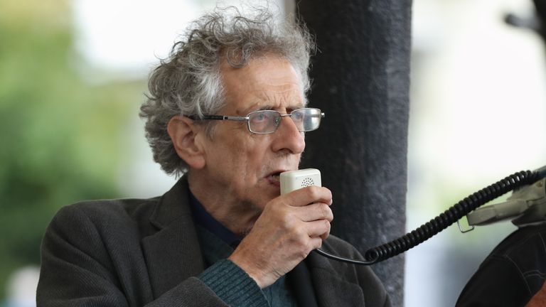 Piers Corbyn (left) the brother of former Labour Party leader Jeremy Corbyn, speaking at a Stop New Normal protest at Portobello Green in London