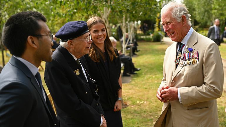 Prince Charles speaks to a veteran