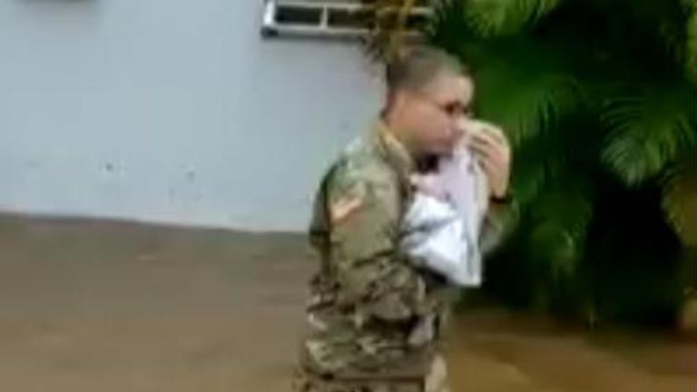Puerto Rico national guard rescue a baby from flooding 