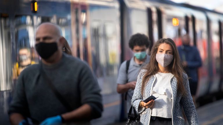 Passengers wearing face masks at Waterloo Station in London as face coverings become mandatory on public transport in England 6/15/2020