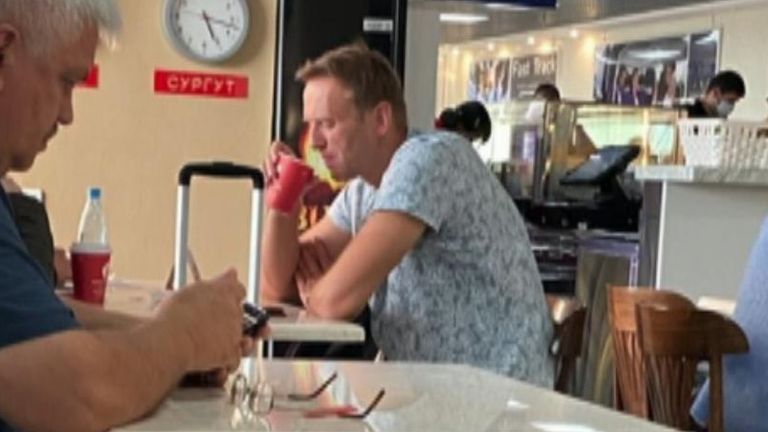 Alexei Navalny is seen at a Siberian airport before boarding the plane where he was taken ill. Pic: @djpavlin