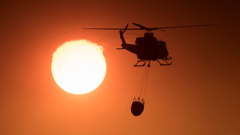 Rescue helicopters battled with huge blazes across Andalusia