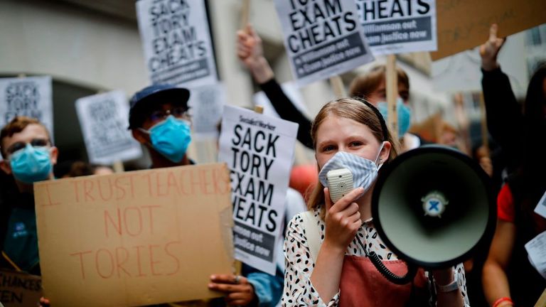 Students held placards outside the Department for Education after the downgrading of A-level results