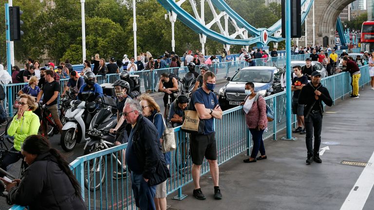 Pedestrians, cyclists and traffic stuck on Tower Bridge, which was closed for around an hour due a mechanical fault
