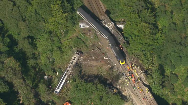 Aerial shots showed one of the carriages on its side 