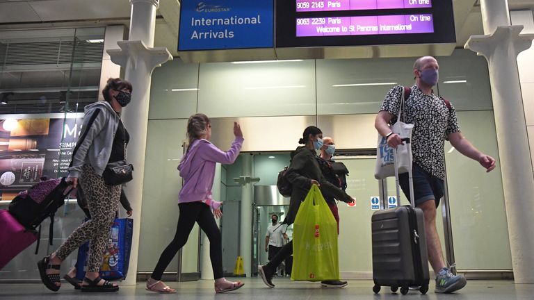 Travellers arriving from the Eurostar at St Pancras International railway station