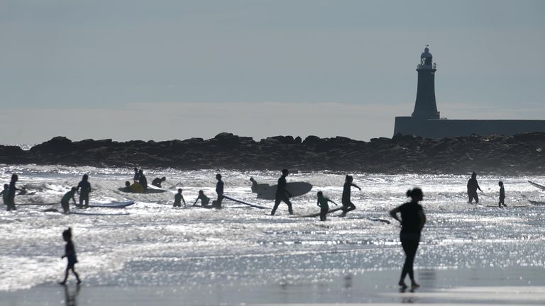 People enjoy the beach at Tynemouth despite the unseasonably cooler temperatures
