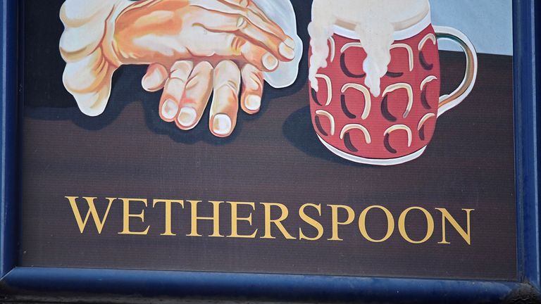  A Wetherspoon&#39;s logo is seen at a pub in central London