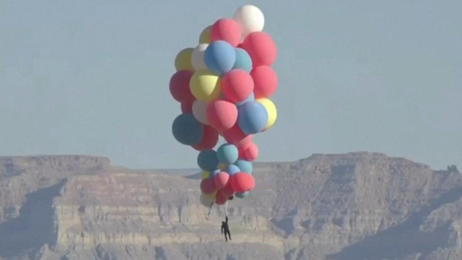 David Blaine floats above the desert holding balloons US News Sky News