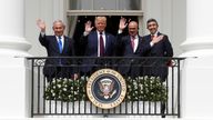 Benjamin Netanyahu, Donald Trump, Abdullatif Al Zayani and Abdullah bin Zayed wave from the White House balcony after signing the Abraham Accords