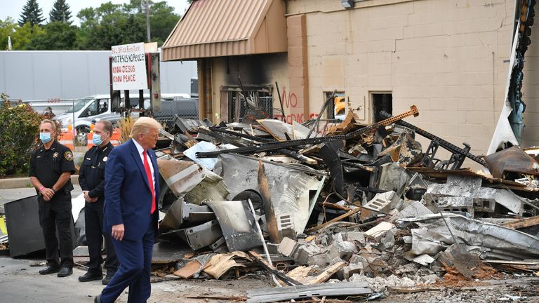 US President Donald Trump tours an area affected by civil unrest in Kenosha, Wisconsin on September 1, 2020. - Trump visited Kenosha, the Wisconsin city at the center of a raging US debate over racism, despite pleas to stay away and claims he is dangerously fanning tensions as a reelection ploy. (Photo by MANDEL NGAN / AFP) (Photo by MANDEL NGAN/AFP via Getty Images)