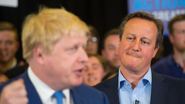 Prime Minister David Cameron watches as Mayor of London Boris Johnson speaks during a campaign event at Grey Court School in Richmond, London.