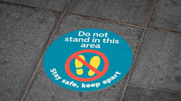 Social distancing advice on the pavement in Leicester, as the citys spike in coronavirus cases has sparked a report that it may be the first UK location to be subjected to a district lockdown.