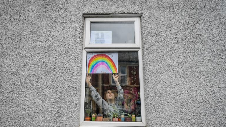 File photo dated 1/4/2020 of seven year old Jack Tucker placing his rainbow in the window of a house in Bedminster, Bristol.  Wednesday marks 100 days since the UK's first full day of lockdown and six months since China alerted the WHO to the Wuhan cases.