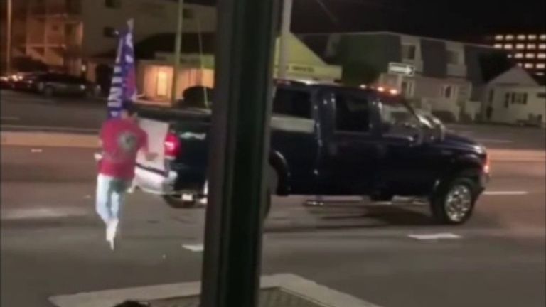 A man was filmed ripping a Trump flag from a truck in Maryland.