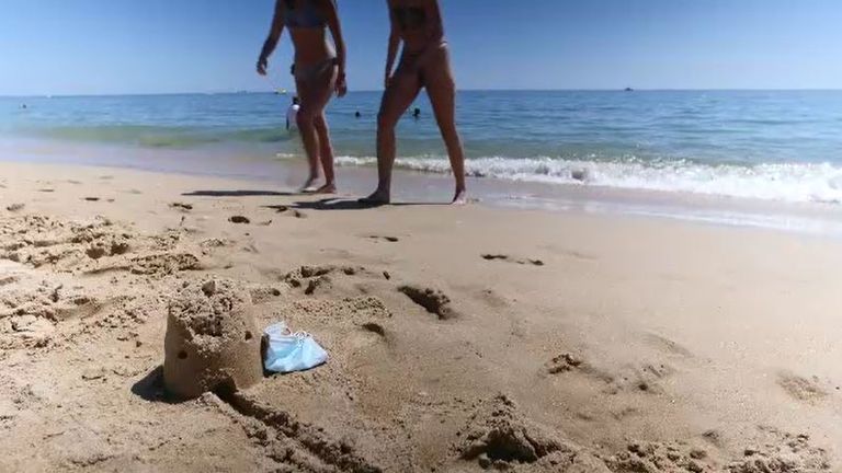 British tourists on a beach in Albufeira, in Portugal&#39;s Algarve