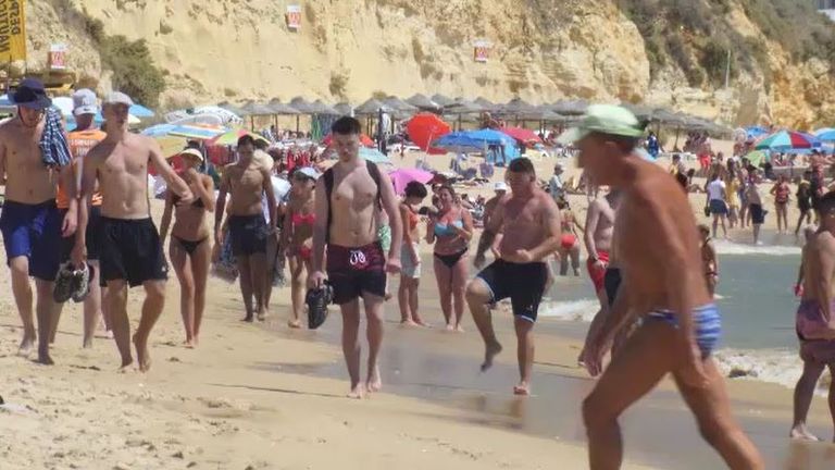 British tourists on a beach in the Algarve