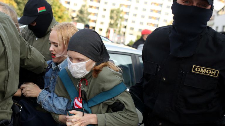 Law enforcement officers detain women during a rally to protest against the Belarus presidential election results in Minsk on September 19, 2020. - Belarus President Alexander Lukashenko, who has ruled the ex-Soviet state for 26 years, claimed to have defeated opposition leader Svetlana Tikhanovskaya with 80 percent of the vote in the August 9, elections. (Photo by - / TUT.BY / AFP) (Photo by -/TUT.BY/AFP via Getty Images)
