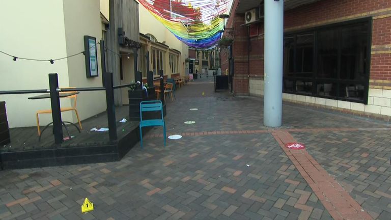 Police evidence markers on a city centre street