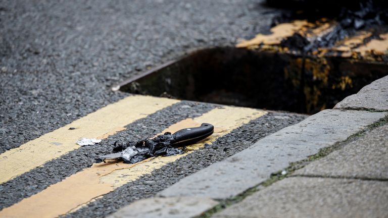 A knife lies on the pavement after being recovered by police from a drain following reported stabbings in Birmingham September 6, 2020 - it is not known if this is the weapon used