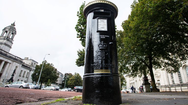 The four black postboxes are in London, Glasgow, Cardiff and Belfast
