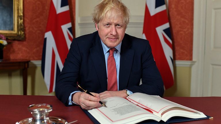 Boris Johnson formally signed the Withdrawal Agreement in January. Pic:  Andrew Parsons / 10 Downing Street